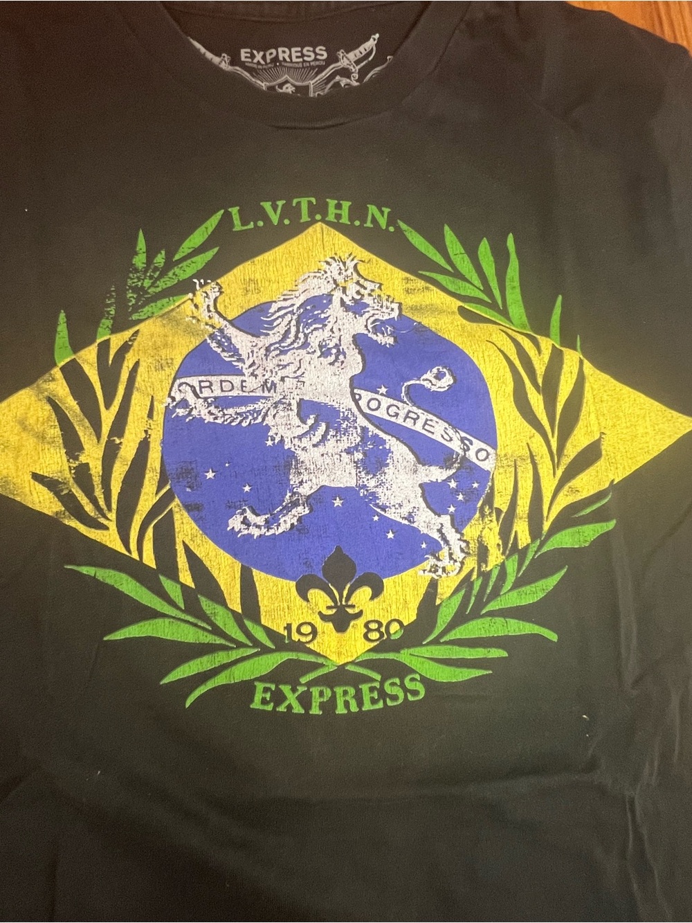 Express Black Short Sleeve Graphic Tee with Yellow, Blue & Green Crest